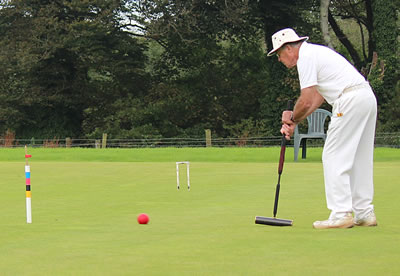 Tony Backhouse pegs out red to win 
The President's Cup for Association Croquet